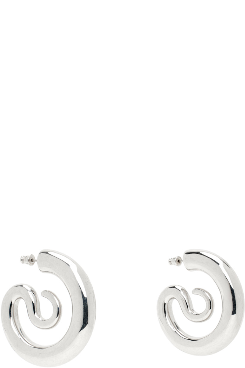 Pair of open hoop earrings in rhodium-plated copper.

· Post-stud fastening
· D1.75"

Supplier color: Copper silver