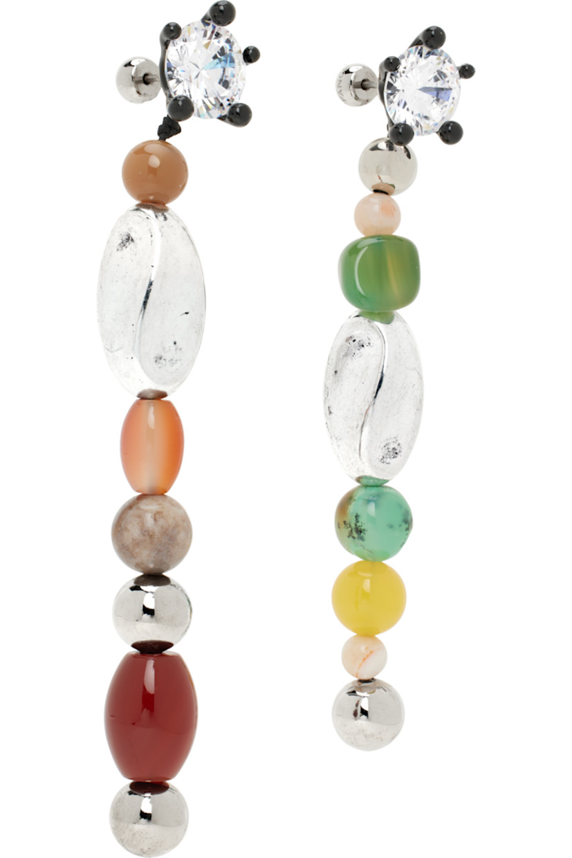 Pair of mismatched drop earrings in rhodium-plated brass.

· Prong-set cubic zirconia stone at face
· Black enamel and resin beads
· Agate, carnelian, and fluorite stones at drop
· Post-stud fastening 
· H4" x W0.5"; H3.75" x W0.5"

Supplier color: Brass/Multi