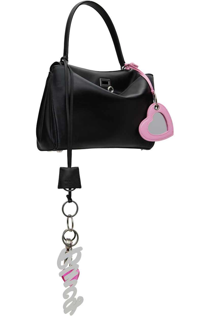 Smooth calfskin top handle bag in black. Detachable sheathed keyring, logo-engraved key charms, graphic charms, and mirror at strap.

· Fading and distressing throughout
· Fixed shoulder strap
· Detachable crossbody strap
· Press-stud fastenings at sides
· Patch pockets at back face
· Bumper studs at base
· Turn-lock closure
· Zip pocket at two-compartment interior
· Nappa lambskin lining
· Logo-engraved antiqued silver-tone hardware
· H8" x W10.5" x D4"

Supplier color: Black