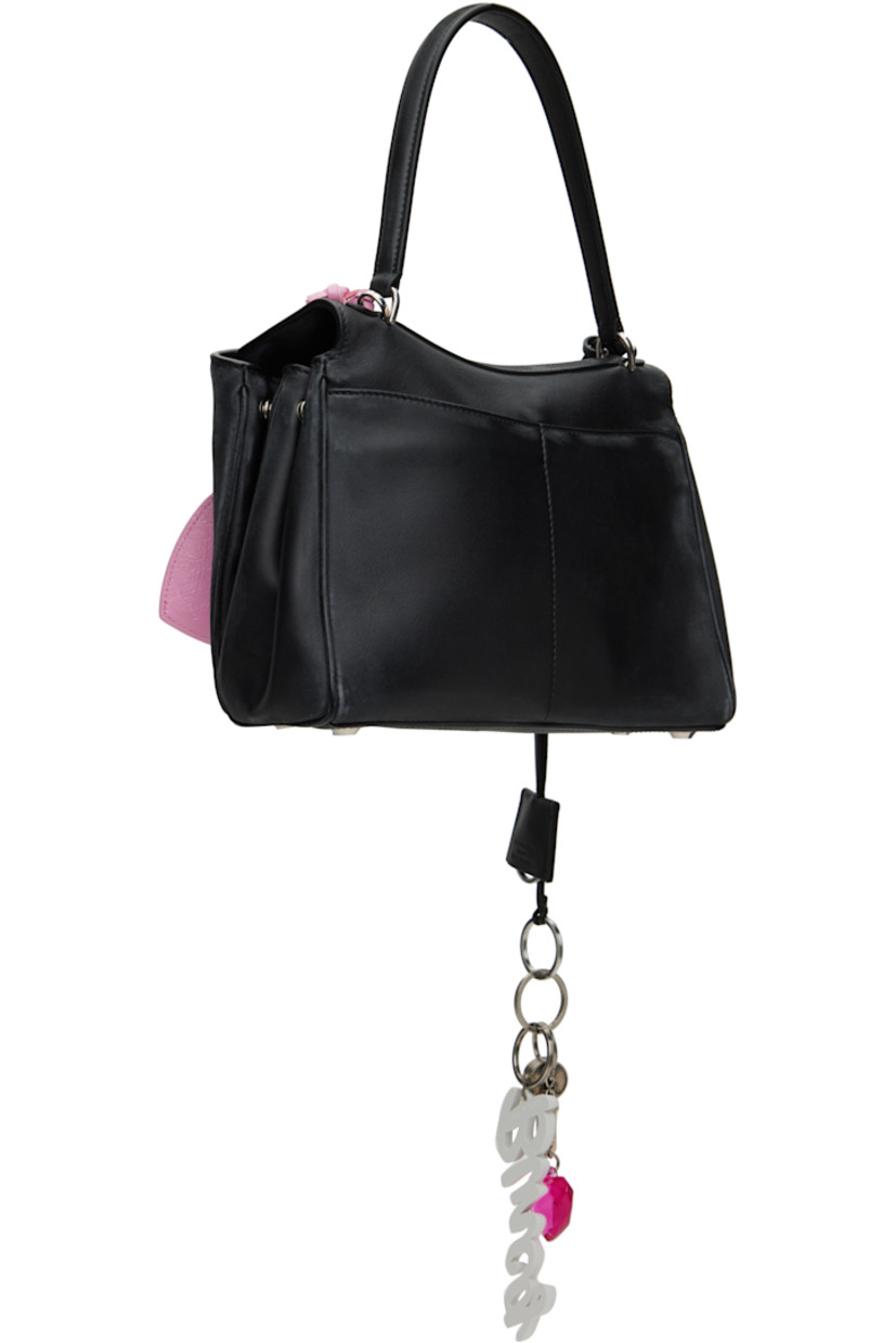 Smooth calfskin top handle bag in black. Detachable sheathed keyring, logo-engraved key charms, graphic charms, and mirror at strap.

· Fading and distressing throughout
· Fixed shoulder strap
· Detachable crossbody strap
· Press-stud fastenings at sides
· Patch pockets at back face
· Bumper studs at base
· Turn-lock closure
· Zip pocket at two-compartment interior
· Nappa lambskin lining
· Logo-engraved antiqued silver-tone hardware
· H8" x W10.5" x D4"

Supplier color: Black