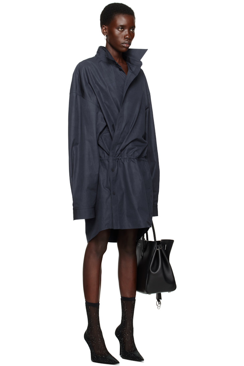 Washed cotton poplin minidress. 

· Spread collar
· Offset button closure
· Drawstring at waist
· Dropped shoulders
· Pleat at buttoned barrel cuffs

Supplier color: Faded blue
