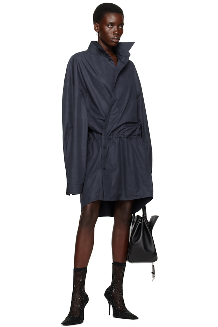 Washed cotton poplin minidress. 

· Spread collar
· Offset button closure
· Drawstring at waist
· Dropped shoulders
· Pleat at buttoned barrel cuffs

Supplier color: Faded blue