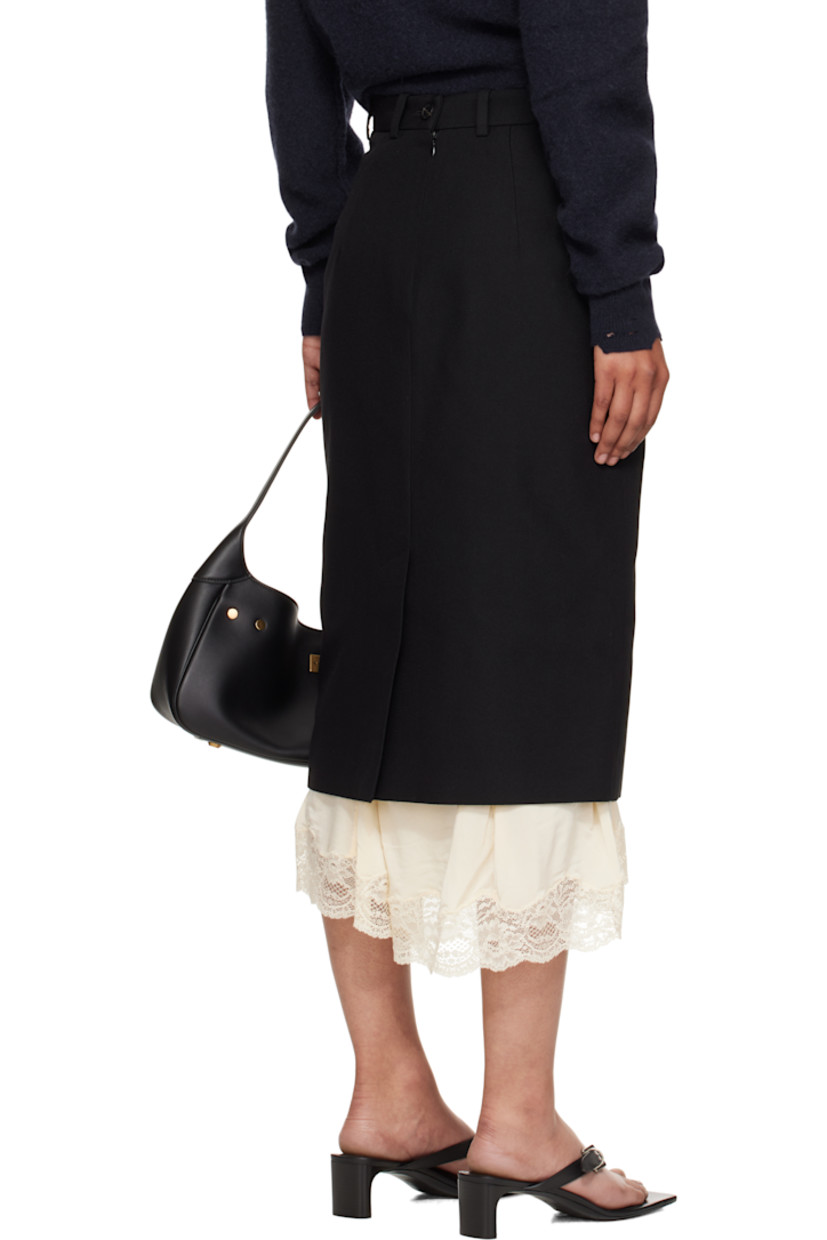 Wool barathea midi skirt. Exposed stretch viscose jersey slip with scalloped lace trim at hem.

· Paneled construction 
· Belt loops
· Zip fly
· Central vent at front hem 
· Partial satin lining 

Supplier color: Black