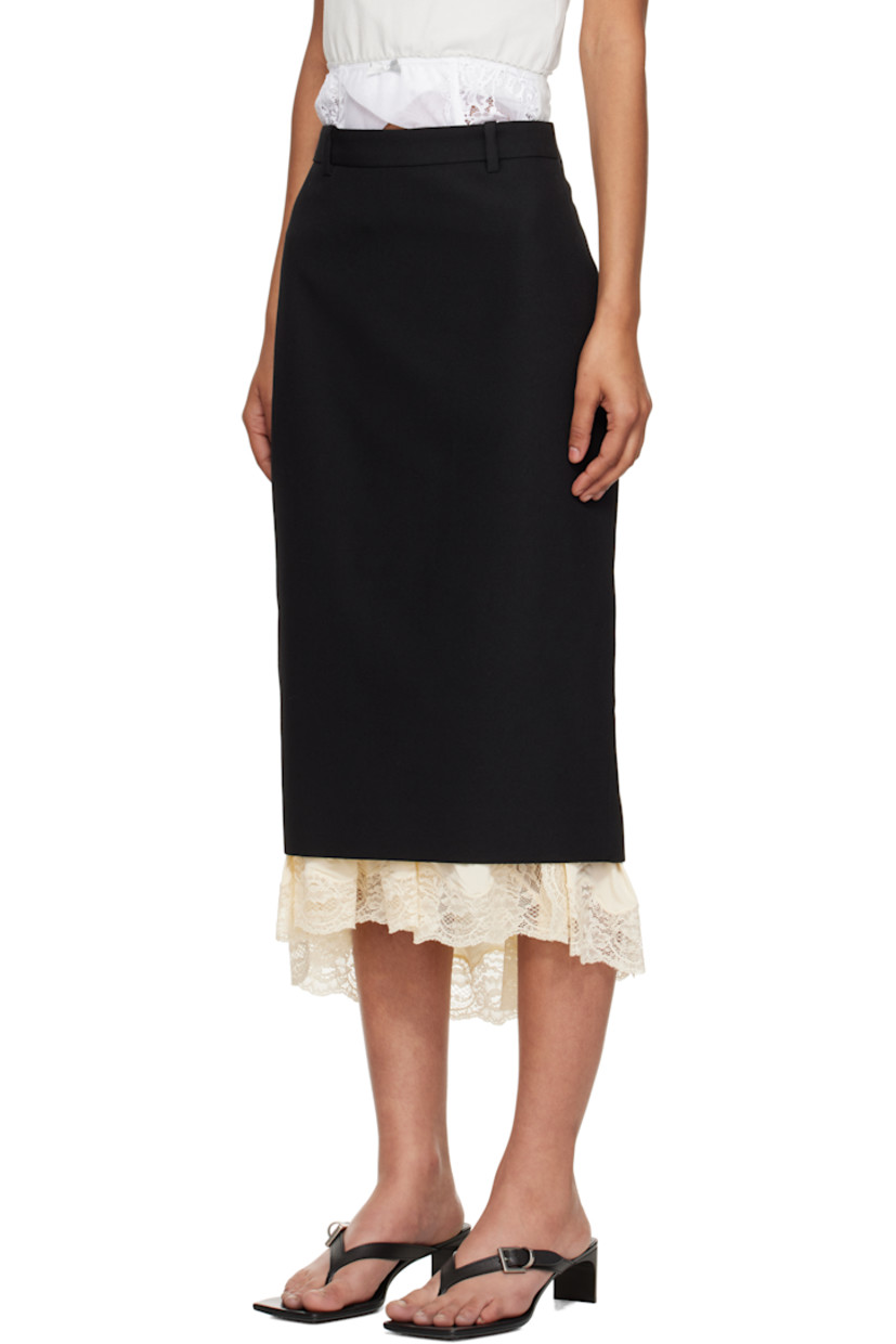 Wool barathea midi skirt. Exposed stretch viscose jersey slip with scalloped lace trim at hem.

· Paneled construction 
· Belt loops
· Zip fly
· Central vent at front hem 
· Partial satin lining 

Supplier color: Black