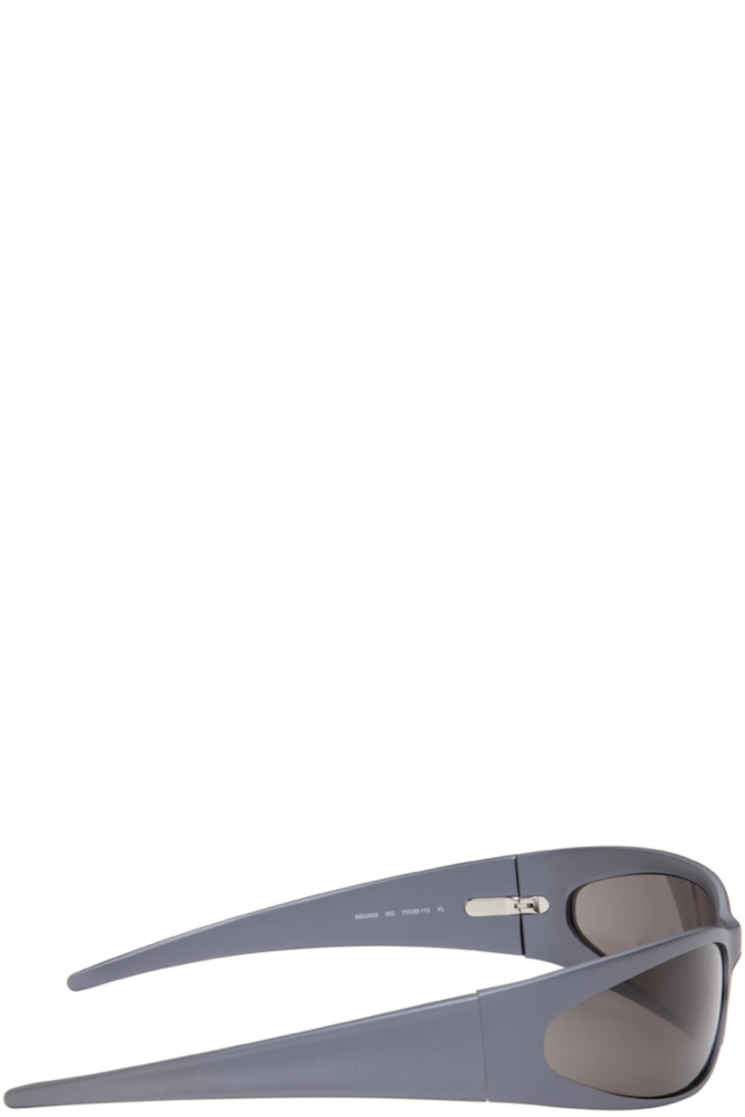 Wraparound rectangular aluminum-frame sunglasses in gunmetal tone.

· Mirrored gray lenses
· 100% UVA/UVB protection, Category 3
· Integrated nose pads
· Logo engraved at temple
· Includes case
· Size: 77.20 115

Supplier color: Grey/Grey/Grey