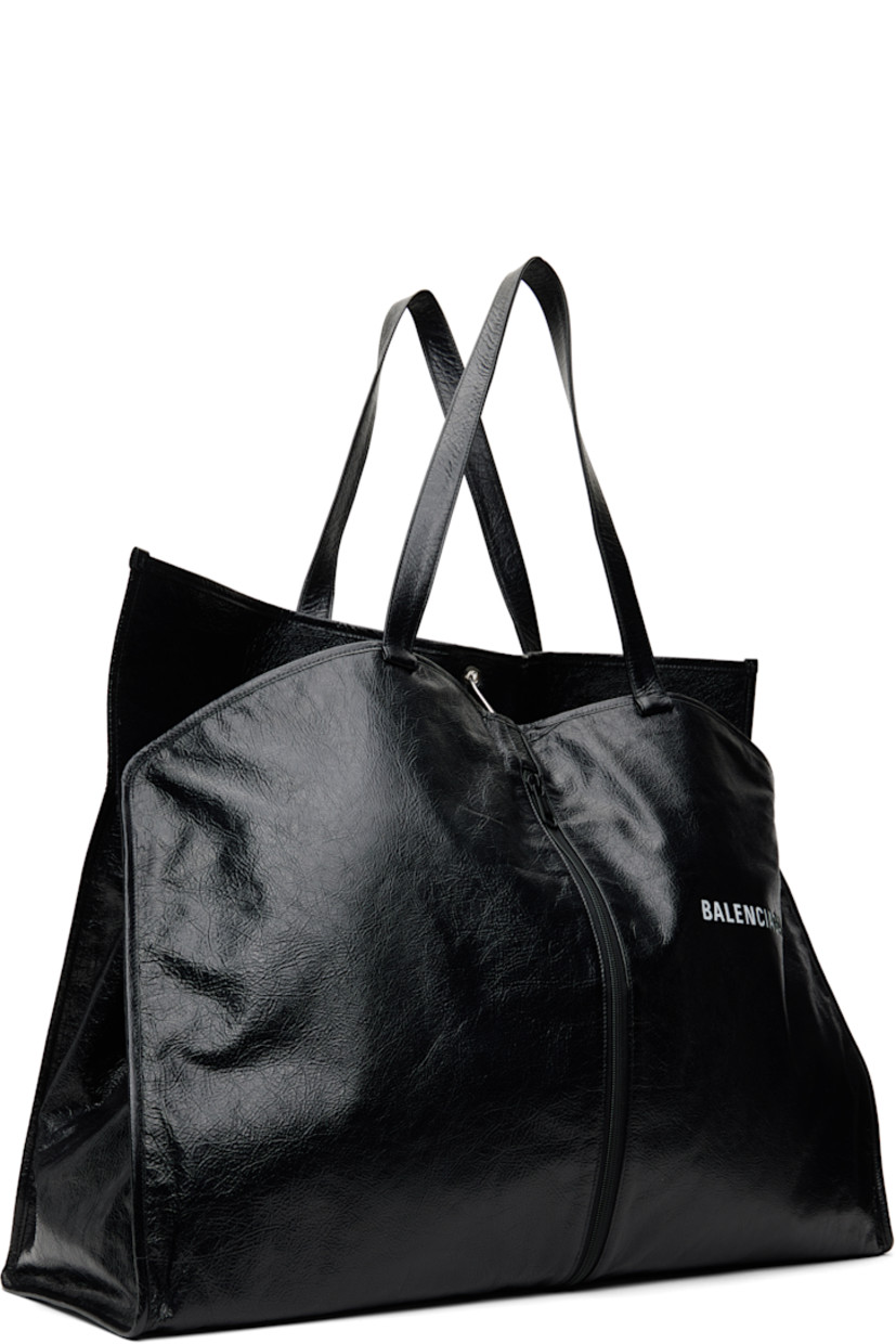 Crinkled patent lambskin tote in black.

· Twin shoulder straps
· Logo embossed at face
· Zip pocket at face
· Press-stud fastening at sides
· Hook toggle closure
· Zip pocket at interior
· Logo-woven taffeta lining
· Logo-engraved black hardware
· H19.5" x W25" x D9"

Supplier color: Black