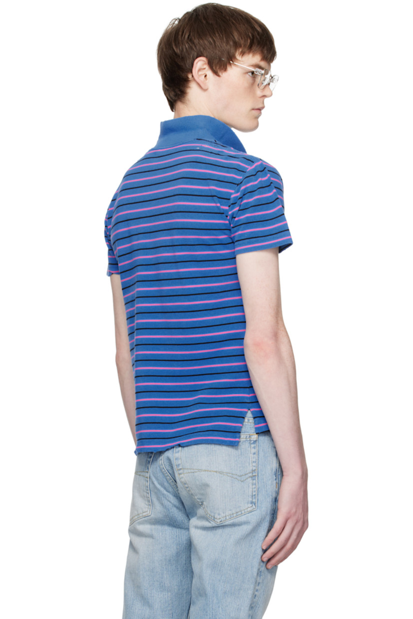 Cotton piqué polo.

· Distressing and stripes throughout
· Rib-knit spread collar
· Two-button placket
· Logo embroidered at chest
· Tennis-tail hem

Supplier color: Blue/Pink/Black
