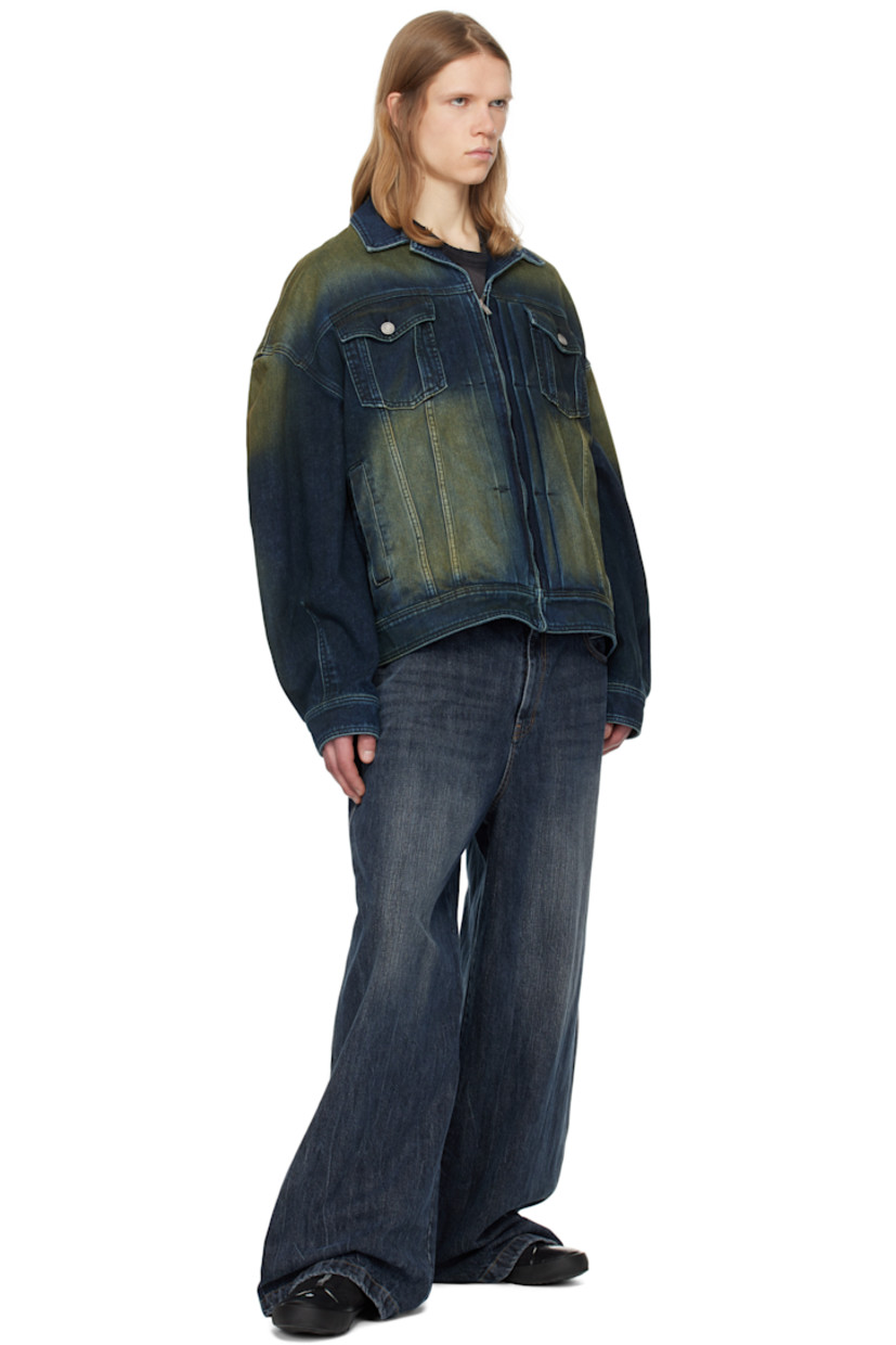 Non-stretch denim jacket. Fading throughout.

· Button fastening at spread collar
· Zip closure
· Pleats at front
· Flap and welt pockets
· Zip vent at side seams
· Single-button barrel cuffs
· Adjustable button tabs at back hem 

Supplier color: Navy