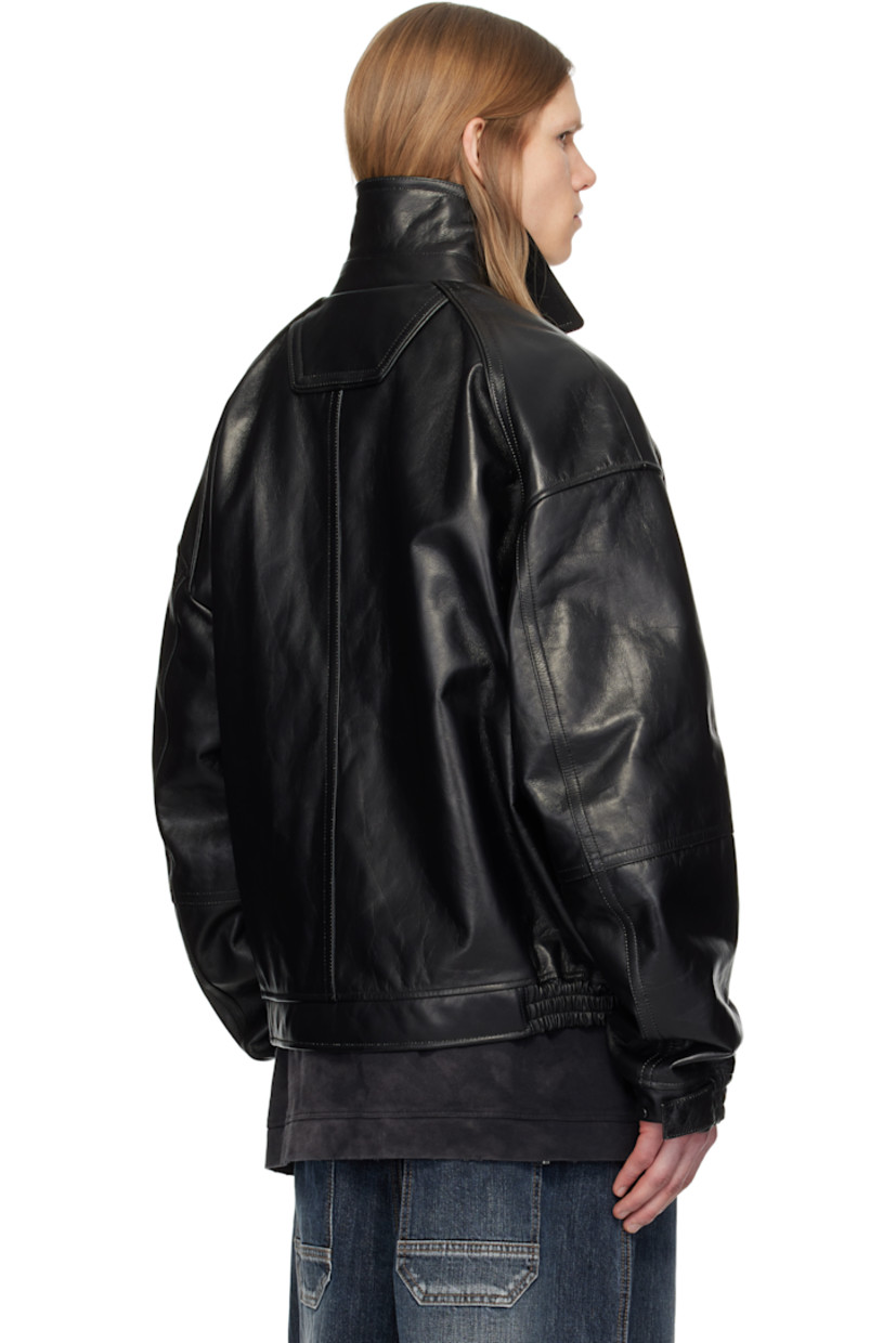 Padded grained leather bomber jacket.

· Spread collar
· Two-way zip closure
· Welt pockets
· Partially elasticized hem
· Raglan sleeves
· Adjustable press-stud tab at elasticized cuffs
· Welt pocket at interior
· Full satin lining

Supplier color: Black