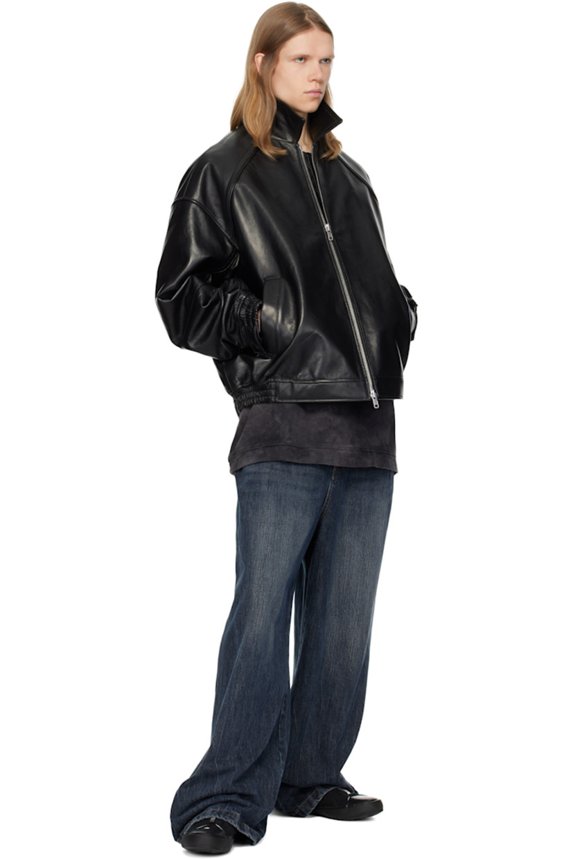 Padded grained leather bomber jacket.

· Spread collar
· Two-way zip closure
· Welt pockets
· Partially elasticized hem
· Raglan sleeves
· Adjustable press-stud tab at elasticized cuffs
· Welt pocket at interior
· Full satin lining

Supplier color: Black