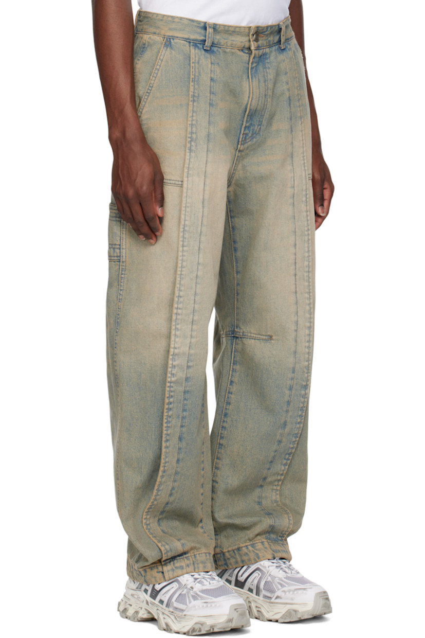 Non-stretch denim jeans. Fading, whiskering, and subtle distressing throughout.

· Belt loops
· Four-pocket styling
· Zip fly
· Pleat at front legs
· Dart at inseams
· Curved outseams
· Hammer loop at back pocket
· Logo hardware at back pocket
· Patch pockets at back leg
· Logo-engraved silver-tone hardware

Supplier color: Blue