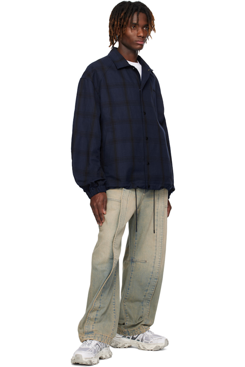 Non-stretch denim jeans. Fading, whiskering, and subtle distressing throughout.

· Belt loops
· Four-pocket styling
· Zip fly
· Pleat at front legs
· Dart at inseams
· Curved outseams
· Hammer loop at back pocket
· Logo hardware at back pocket
· Patch pockets at back leg
· Logo-engraved silver-tone hardware

Supplier color: Blue