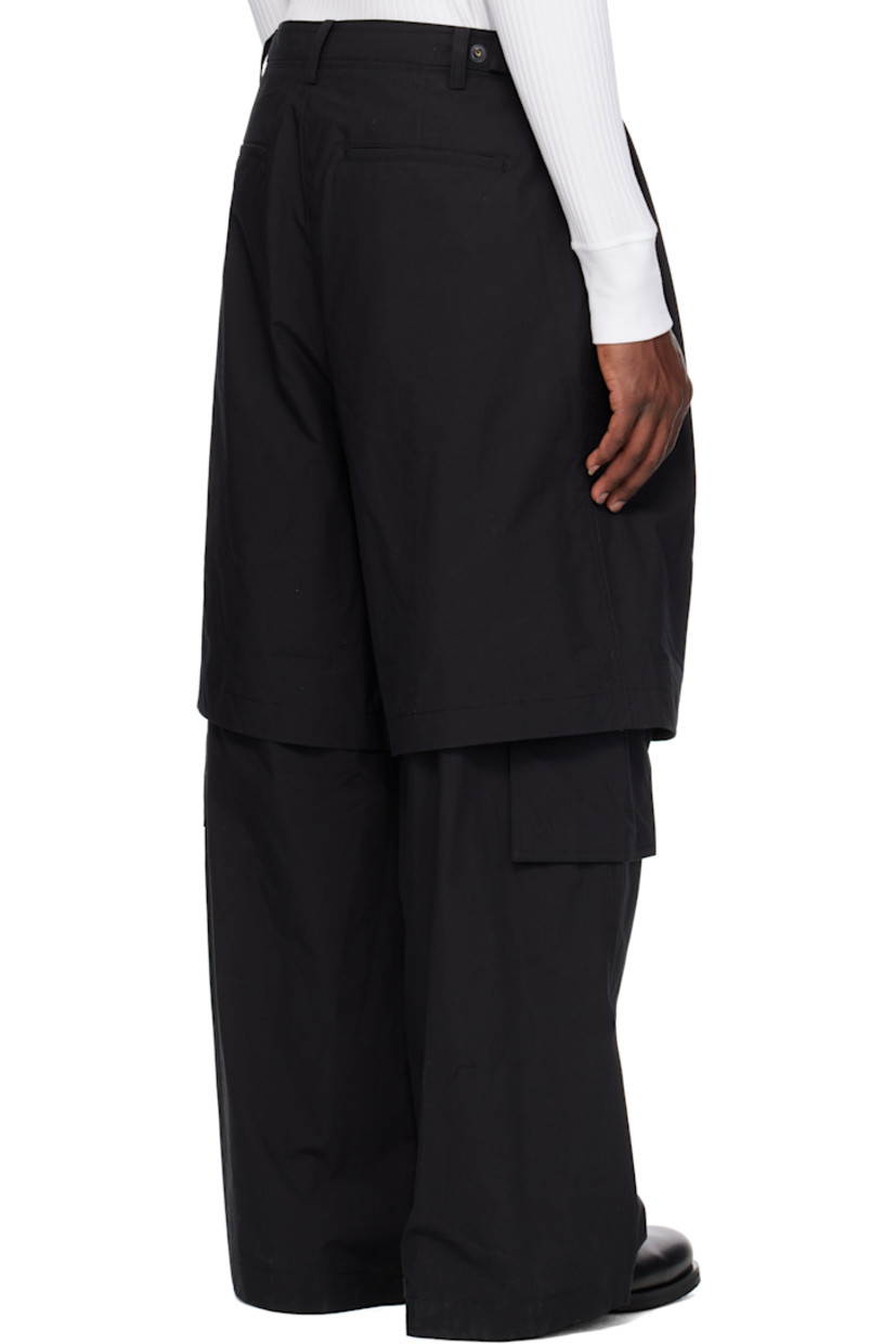 Cotton-blend twill trousers. Detachable zip panel at legs for shorts styling.

· Layered construction
· Belt loops
· Four-pocket styling 
· Zip fly 
· Pleats at front
· Cargo pocket at outseams
· Press-stud cinch tabs at back waistband 

Supplier color: Black