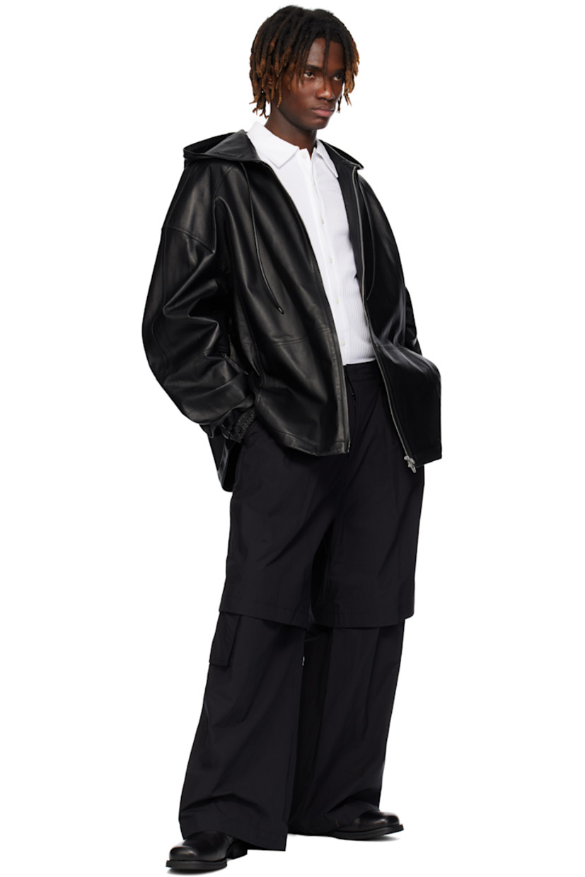 Cotton-blend twill trousers. Detachable zip panel at legs for shorts styling.

· Layered construction
· Belt loops
· Four-pocket styling 
· Zip fly 
· Pleats at front
· Cargo pocket at outseams
· Press-stud cinch tabs at back waistband 

Supplier color: Black