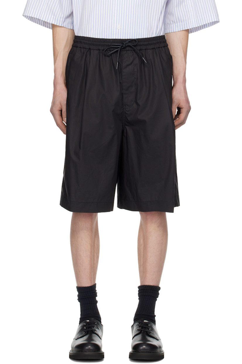 Coated cotton poplin shorts.

· Drawstring at elasticized waistband
· Four-pocket styling
· Zip fly
· Pleats at front
· Logo embroidered at front
· Full mesh lining

Supplier color: Black