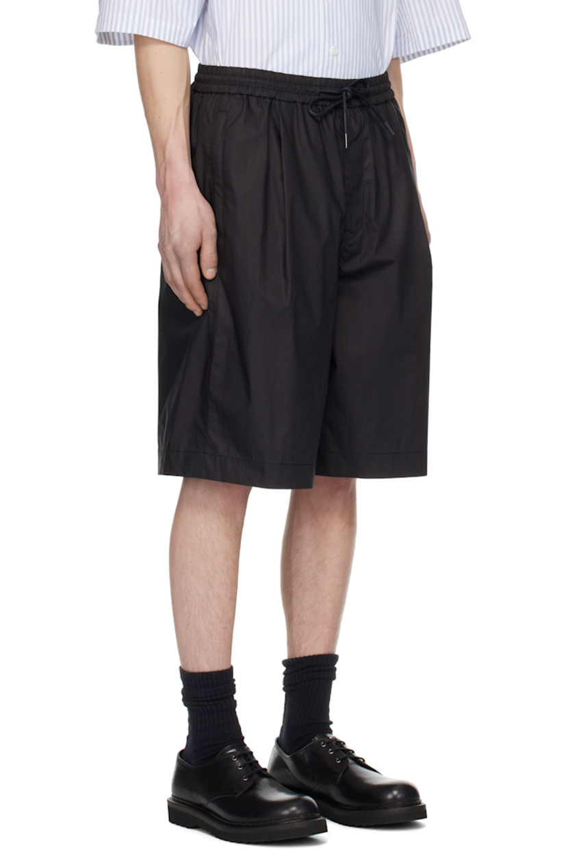 Coated cotton poplin shorts.

· Drawstring at elasticized waistband
· Four-pocket styling
· Zip fly
· Pleats at front
· Logo embroidered at front
· Full mesh lining

Supplier color: Black