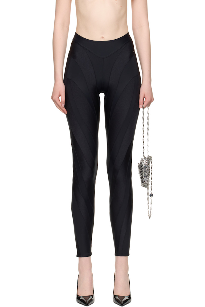 Stretch recycled nylon jersey leggings.

· Paneled construction
· Elasticized waistband
· Logo bonded at outseam

Supplier color: Black