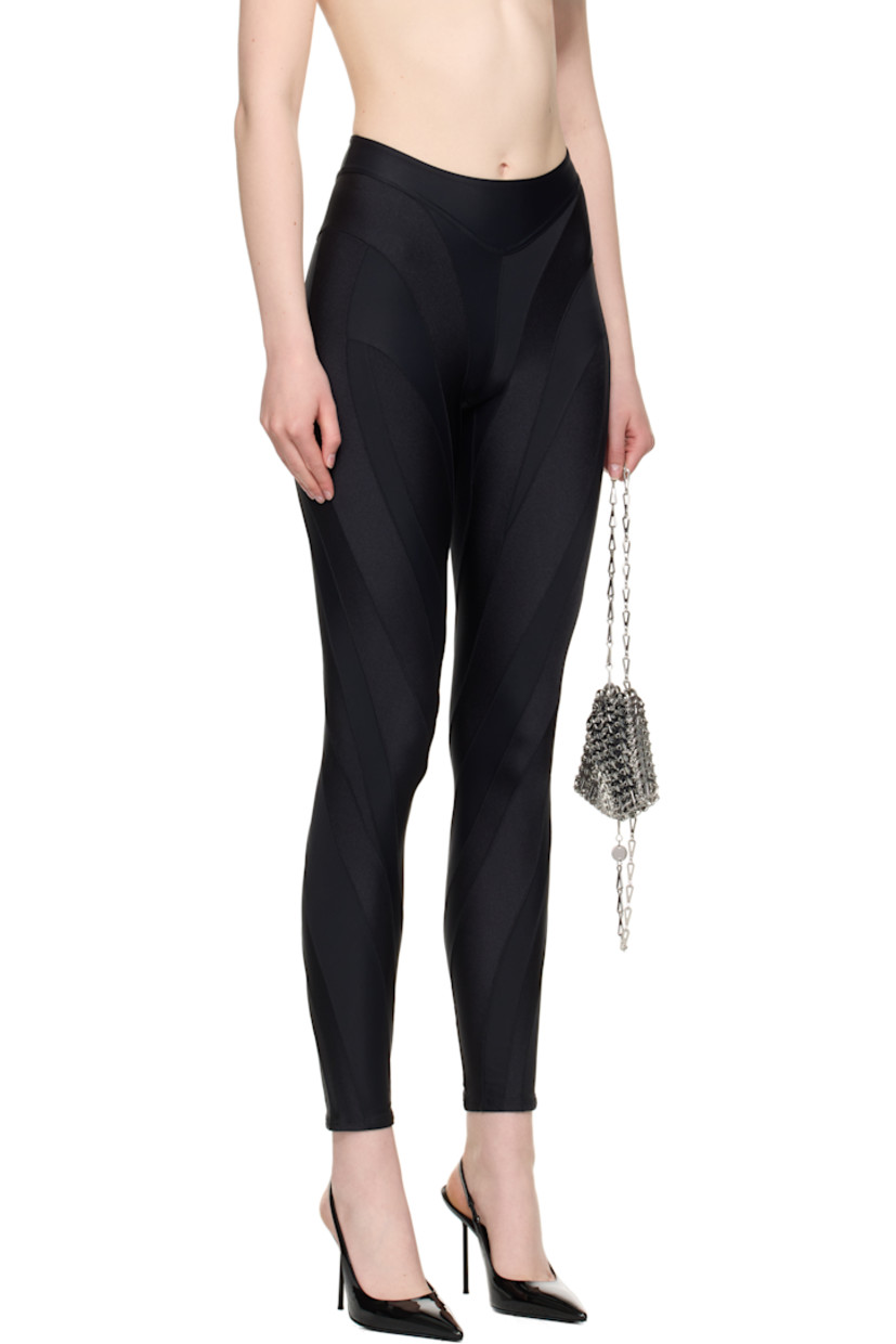 Stretch recycled nylon jersey leggings.

· Paneled construction
· Elasticized waistband
· Logo bonded at outseam

Supplier color: Black