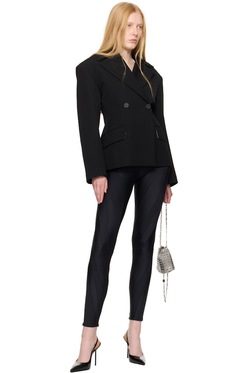 Stretch recycled nylon jersey leggings.

· Paneled construction
· Elasticized waistband
· Logo bonded at outseam

Supplier color: Black