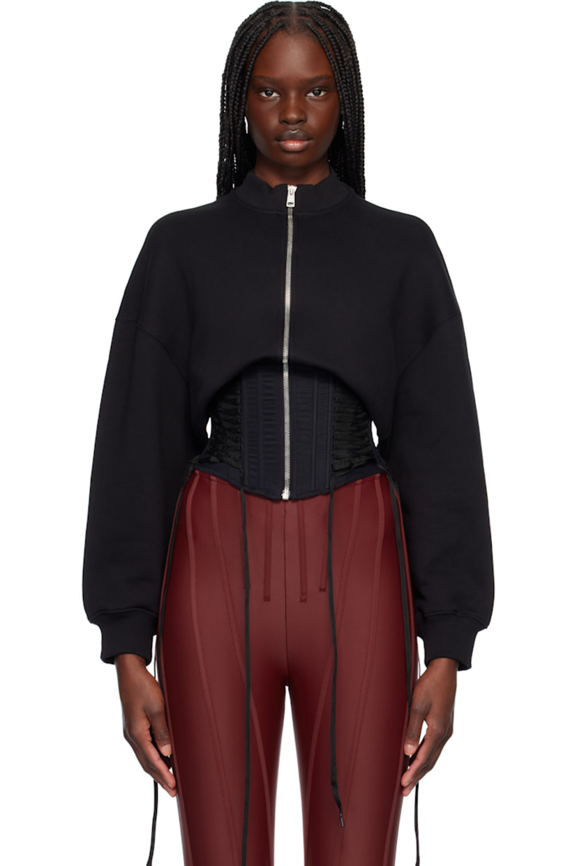 Organic cotton fleece and mesh track jacket.

· Paneled construction
· Rib-knit crewneck and cuffs
· Zip closure
· Boning and lace-up detailing at corset-style hem
· Dropped shoulders
· Logo-plaque at back collar
· Twin pleats at back

Supplier color: Black