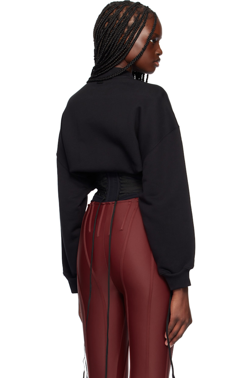 Organic cotton fleece and mesh track jacket.

· Paneled construction
· Rib-knit crewneck and cuffs
· Zip closure
· Boning and lace-up detailing at corset-style hem
· Dropped shoulders
· Logo-plaque at back collar
· Twin pleats at back

Supplier color: Black