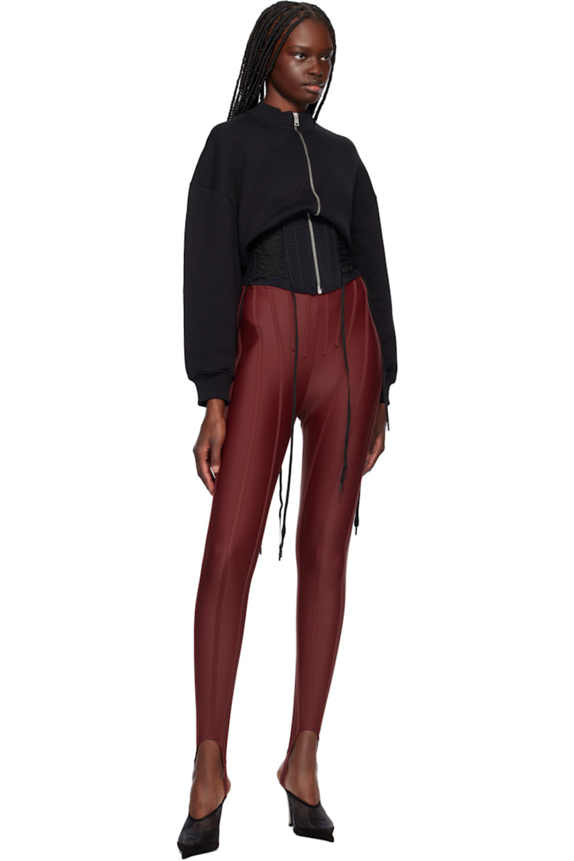Organic cotton fleece and mesh track jacket.

· Paneled construction
· Rib-knit crewneck and cuffs
· Zip closure
· Boning and lace-up detailing at corset-style hem
· Dropped shoulders
· Logo-plaque at back collar
· Twin pleats at back

Supplier color: Black