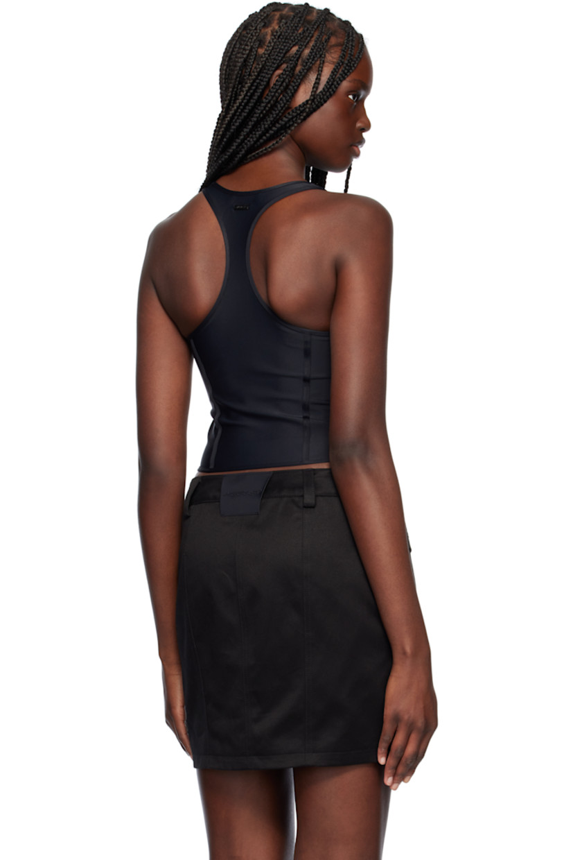 Stretch recycled nylon jersey tank top.

· Scoop neck
· Boning at front waist
· Curved hem
· Racer back
· Logo plaque at back collar

Supplier color: Black