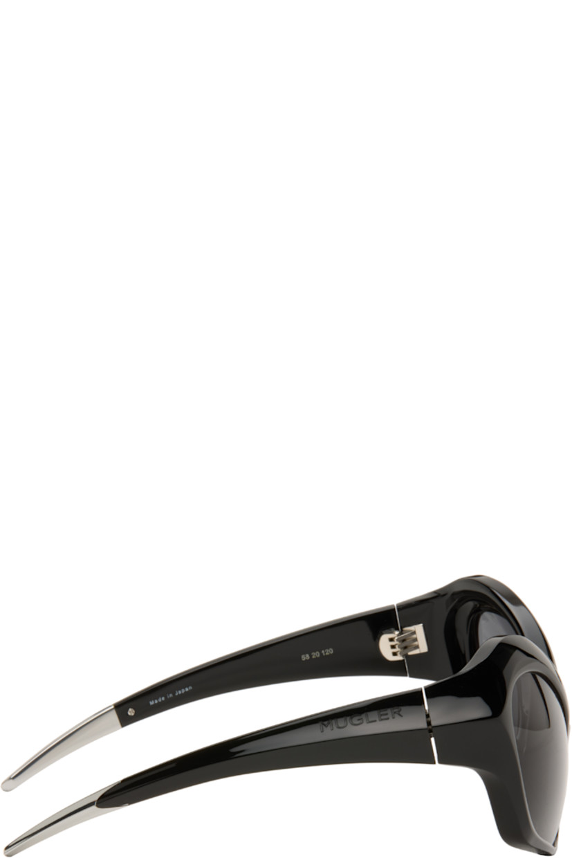 Modified cat-eye acetate-frame sunglasses.

· Integrated nose pads
· Black lenses with 100% UVA/UVB protection
· Logo etched at temples
· Hardware at temple tips
· Titanium hardware
· Logo-embossed squeeze-top pouch
· Size: 58.20 120

Supplier color: Black