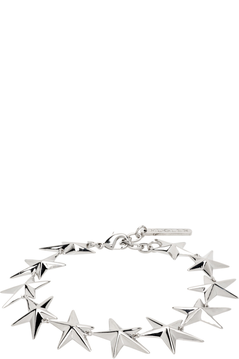 Modified cable chain bracelet in palladium. 

· Graphic charms throughout
· Logo plaque at adjustable lobster clasp 
· L8"

Supplier color: Palladium