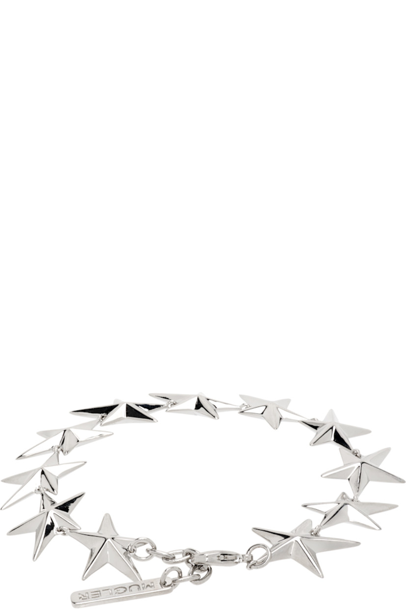 Modified cable chain bracelet in palladium. 

· Graphic charms throughout
· Logo plaque at adjustable lobster clasp 
· L8"

Supplier color: Palladium