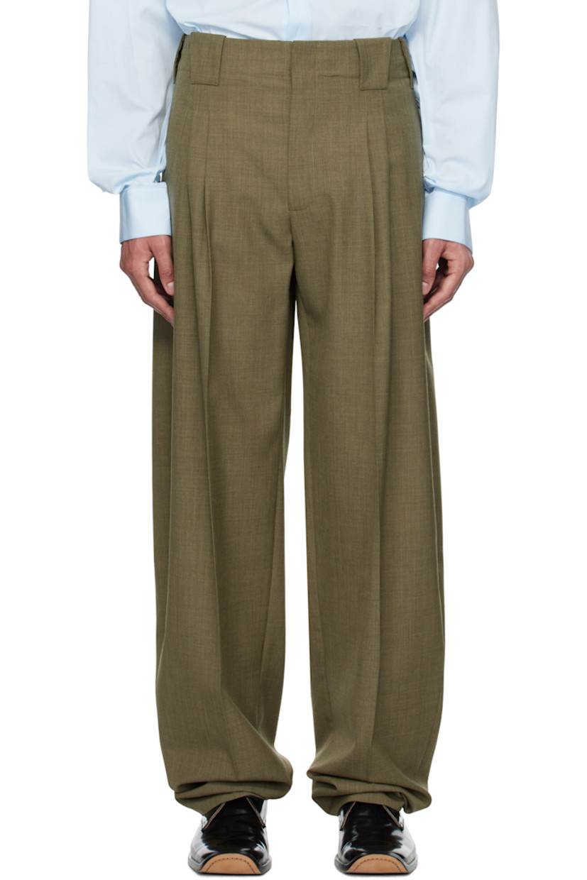 Wide-leg virgin wool canvas trousers.

· Belt loops
· Three-pocket styling
· Zip-fly
· Pleats at front
· Creased legs
· Unlined

Supplier color: Khaki
