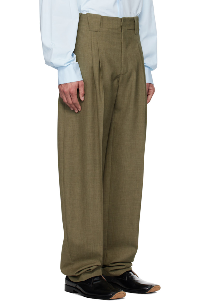 Wide-leg virgin wool canvas trousers.

· Belt loops
· Three-pocket styling
· Zip-fly
· Pleats at front
· Creased legs
· Unlined

Supplier color: Khaki
