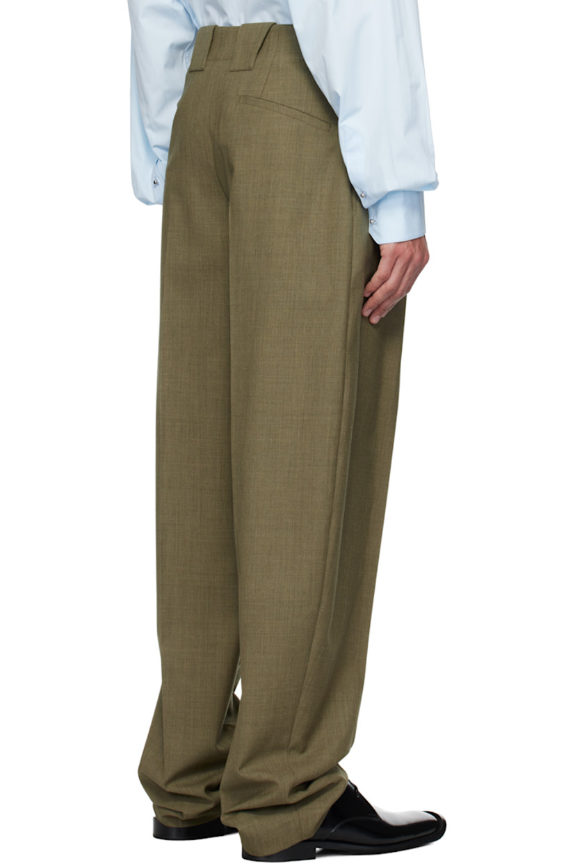 Wide-leg virgin wool canvas trousers.

· Belt loops
· Three-pocket styling
· Zip-fly
· Pleats at front
· Creased legs
· Unlined

Supplier color: Khaki