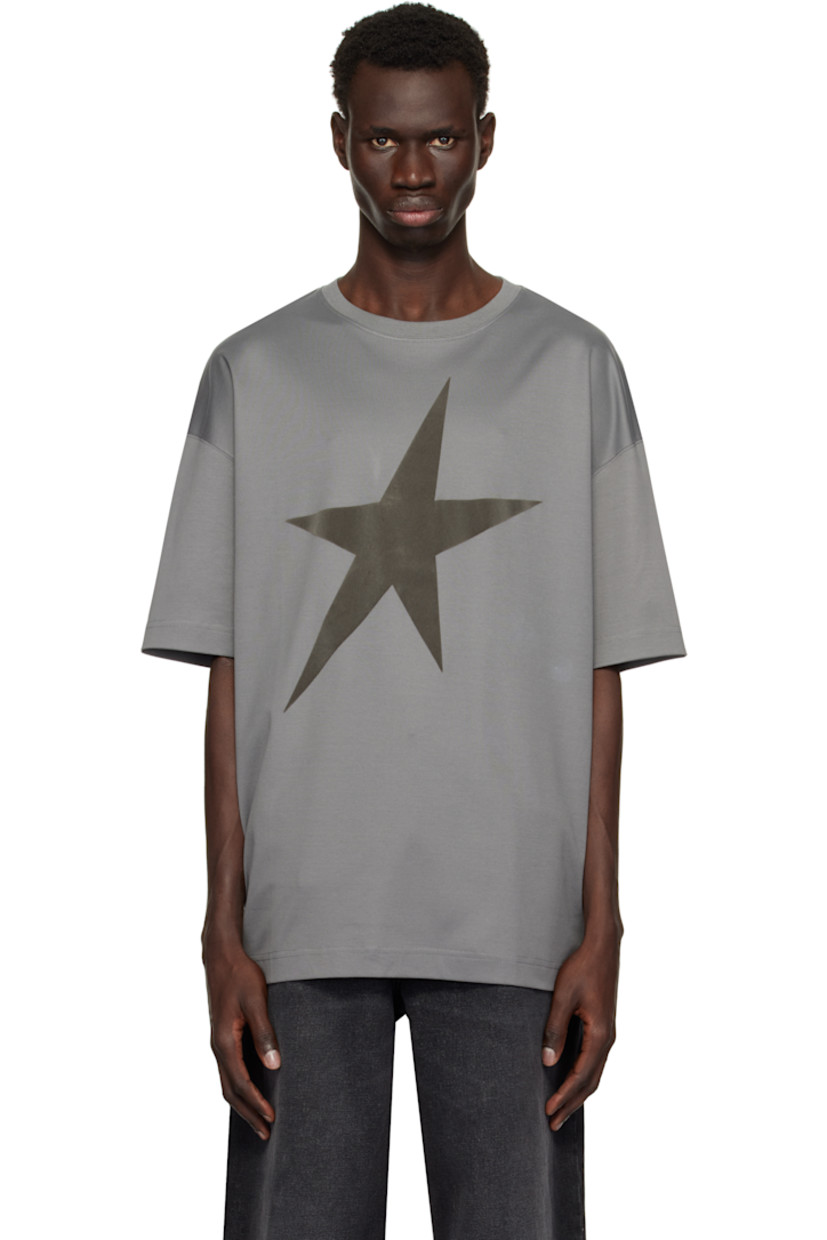 Oversized cotton jersey T-shirt.

· Rib-knit crewneck
· Flocked logo graphic at front
· Dropped shoulders
· Logo plaque at back collar

Supplier color: Grey