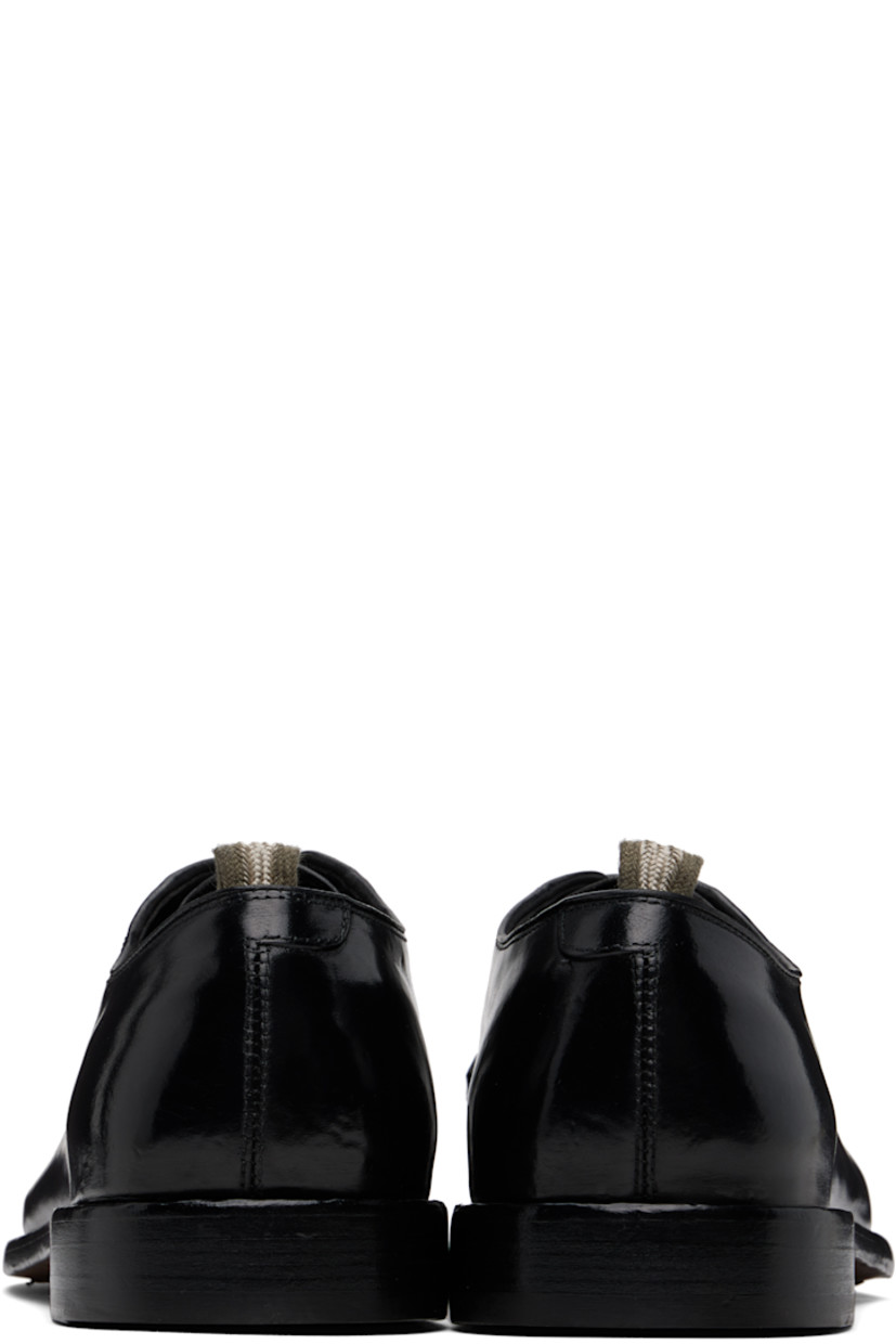 Handcrafted polished leather derbys in black.

· Almond toe 
· Lace-up closure
· Pull-loop at collar 
· Suede lining 
· Topstitching at welt 
· Stacked leather sole 

Supplier color: Nero