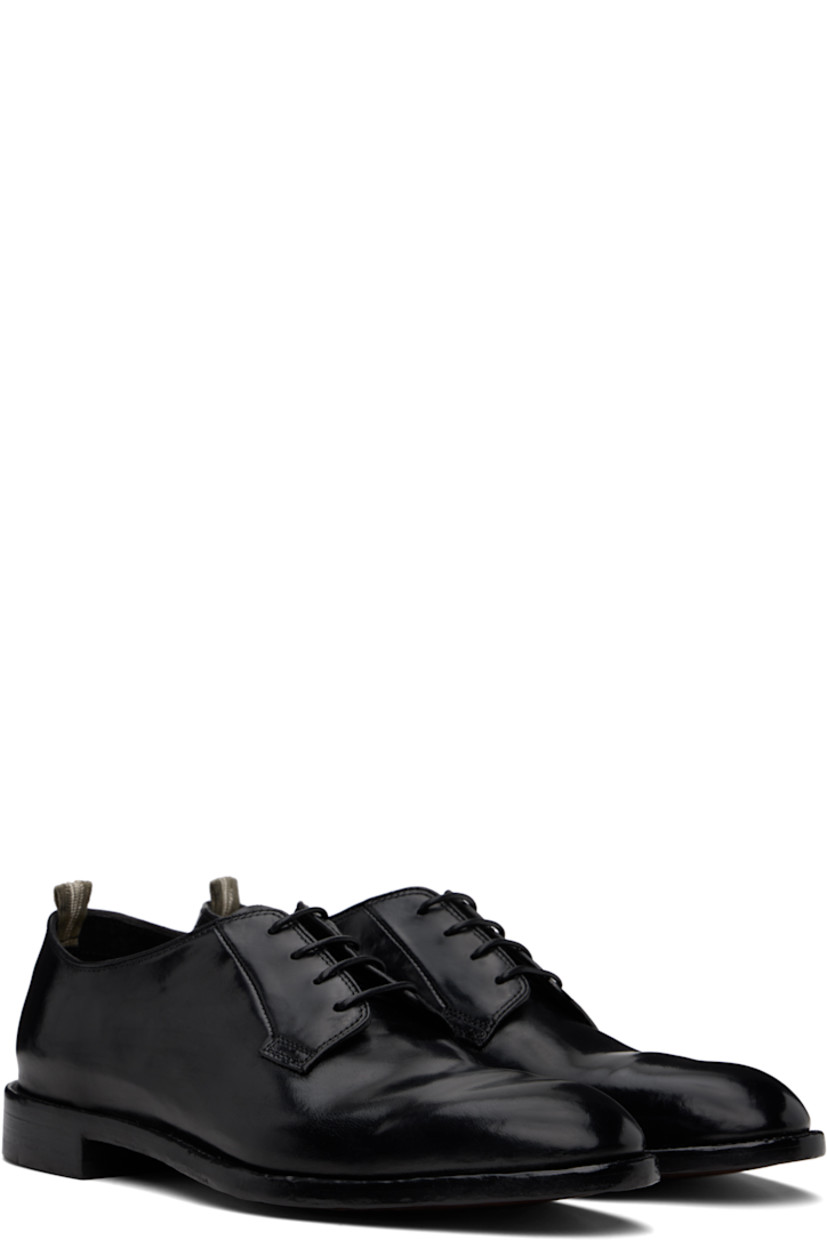 Handcrafted polished leather derbys in black.

· Almond toe 
· Lace-up closure
· Pull-loop at collar 
· Suede lining 
· Topstitching at welt 
· Stacked leather sole 

Supplier color: Nero