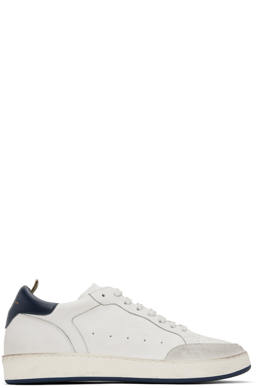 Handcrafted low-top grained calfskin sneakers in white.

· Perforated detailing throughout
· Suede trim at toe
· Lace-up closure
· Logo stamp at padded tongue
· Padded collar
· Grosgrain pull-loop at heel collar
· Logo stamp at heel tab
· Logo embossed at buffed leather footbed
· Grained leather and suede lining
· Treaded rubber sole

Supplier color: Bianco/Blu scur