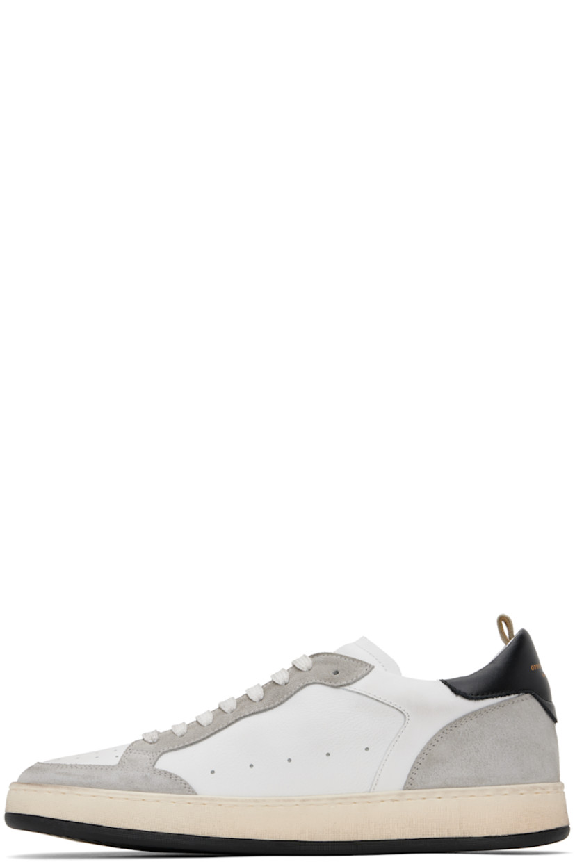 Handcrafted low-top buffed calfskin and calfskin suede sneakers in white and gray.

· Perforated detailing throughout
· Lace-up closure
· Logo at padded tongue and heel tab
· Padded collar
· Grosgrain pull-loop at heel collar
· Logo embossed at grained leather footbed
· Buffed leather lining
· Treaded rubber sole

Supplier color: Nuv/Bia/Nero
