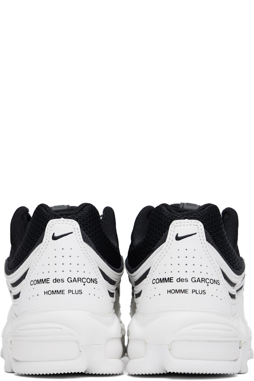 Low-top buffed faux-leather and mesh sneakers in black and white.

· Perforations throughout
· Lace-up closure
· Padded tongue and collar
· Bonded stripes at sides
· Swoosh bonded at outer side
· Swoosh embroidered at heel tab
· Logo printed at heel counter
· Mesh lining
· Max Air Unit at foam rubber midsole
· Treaded rubber sole

Part of the Comme des Garçons Homme Plus x Nike collaboration.

Supplier color: Black/White