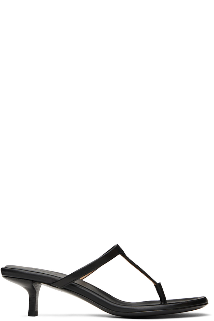 Buffed calfskin heeled sandals in black. 

· Open toe
· Thong-style strap at vamp
· Logo embossed at padded leather footbed
· Stacked leather kitten heel with rubber injection
· Polished leather sole 
· Heel: H1.5"

Supplier color: Black