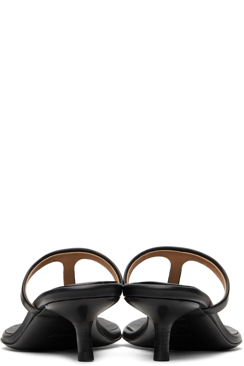 Buffed calfskin heeled sandals in black. 

· Open toe
· Thong-style strap at vamp
· Logo embossed at padded leather footbed
· Stacked leather kitten heel with rubber injection
· Polished leather sole 
· Heel: H1.5"

Supplier color: Black