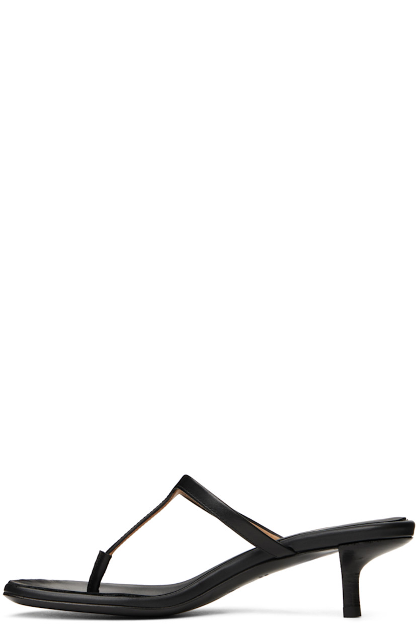 Buffed calfskin heeled sandals in black. 

· Open toe
· Thong-style strap at vamp
· Logo embossed at padded leather footbed
· Stacked leather kitten heel with rubber injection
· Polished leather sole 
· Heel: H1.5"

Supplier color: Black