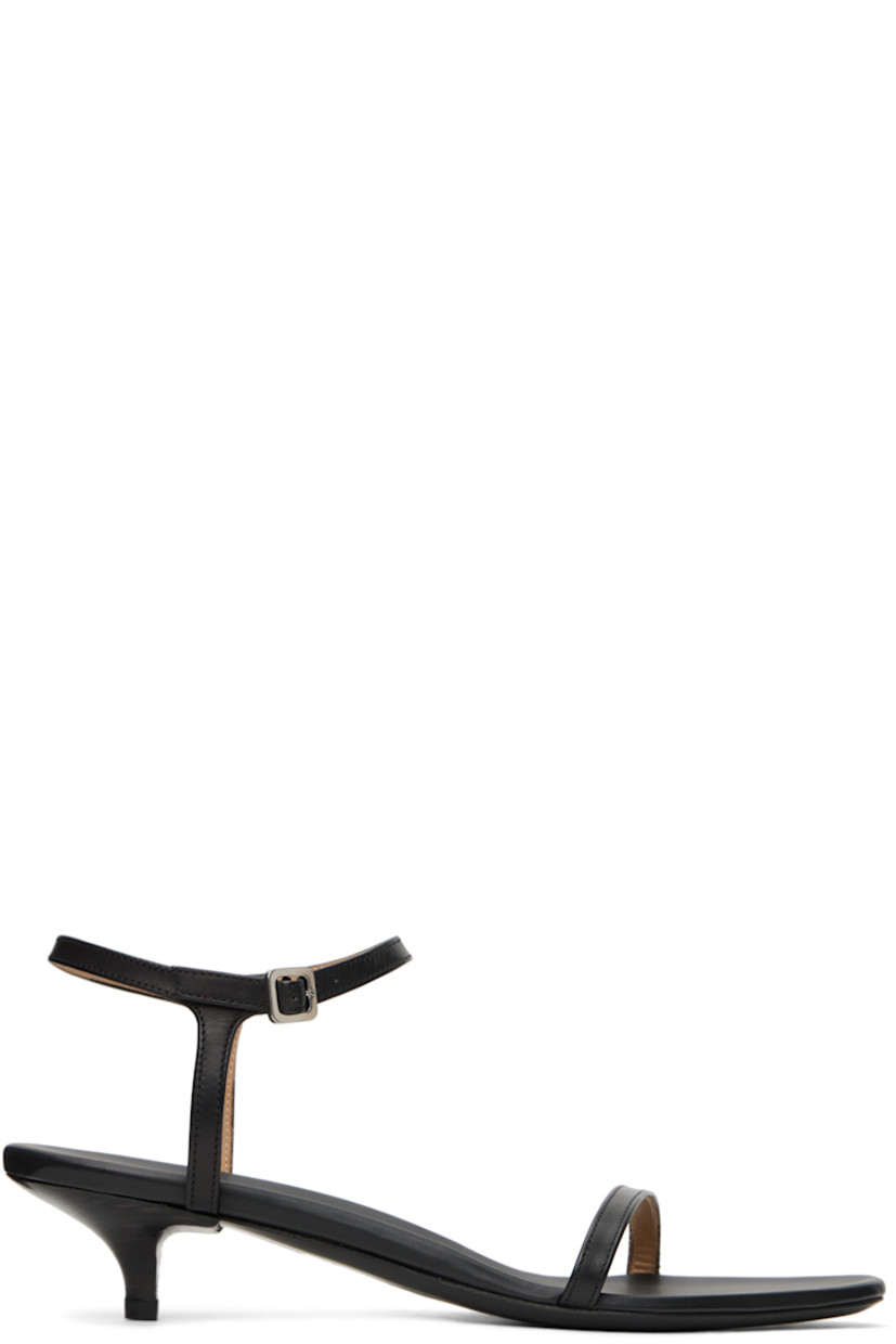 Buffed calfskin heeled sandals in black.

· Open pointed square toe
· Strap at vamp
· Pin-buckle ankle strap
· Logo embossed at padded leather footbed 
· Stacked leather heel with rubber injection
· Polished leather sole
· Heel: H1.5"

Supplier color: Black