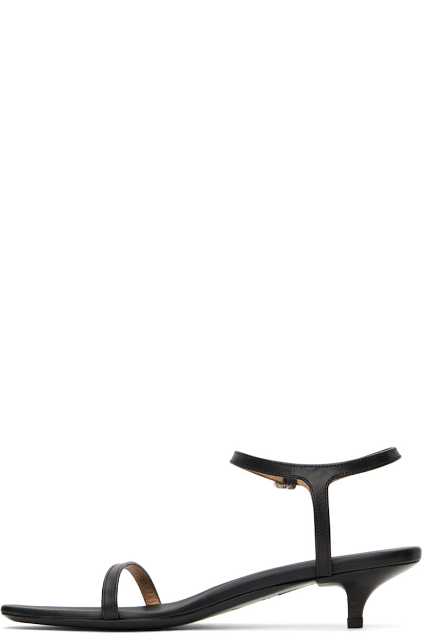 Buffed calfskin heeled sandals in black.

· Open pointed square toe
· Strap at vamp
· Pin-buckle ankle strap
· Logo embossed at padded leather footbed 
· Stacked leather heel with rubber injection
· Polished leather sole
· Heel: H1.5"

Supplier color: Black