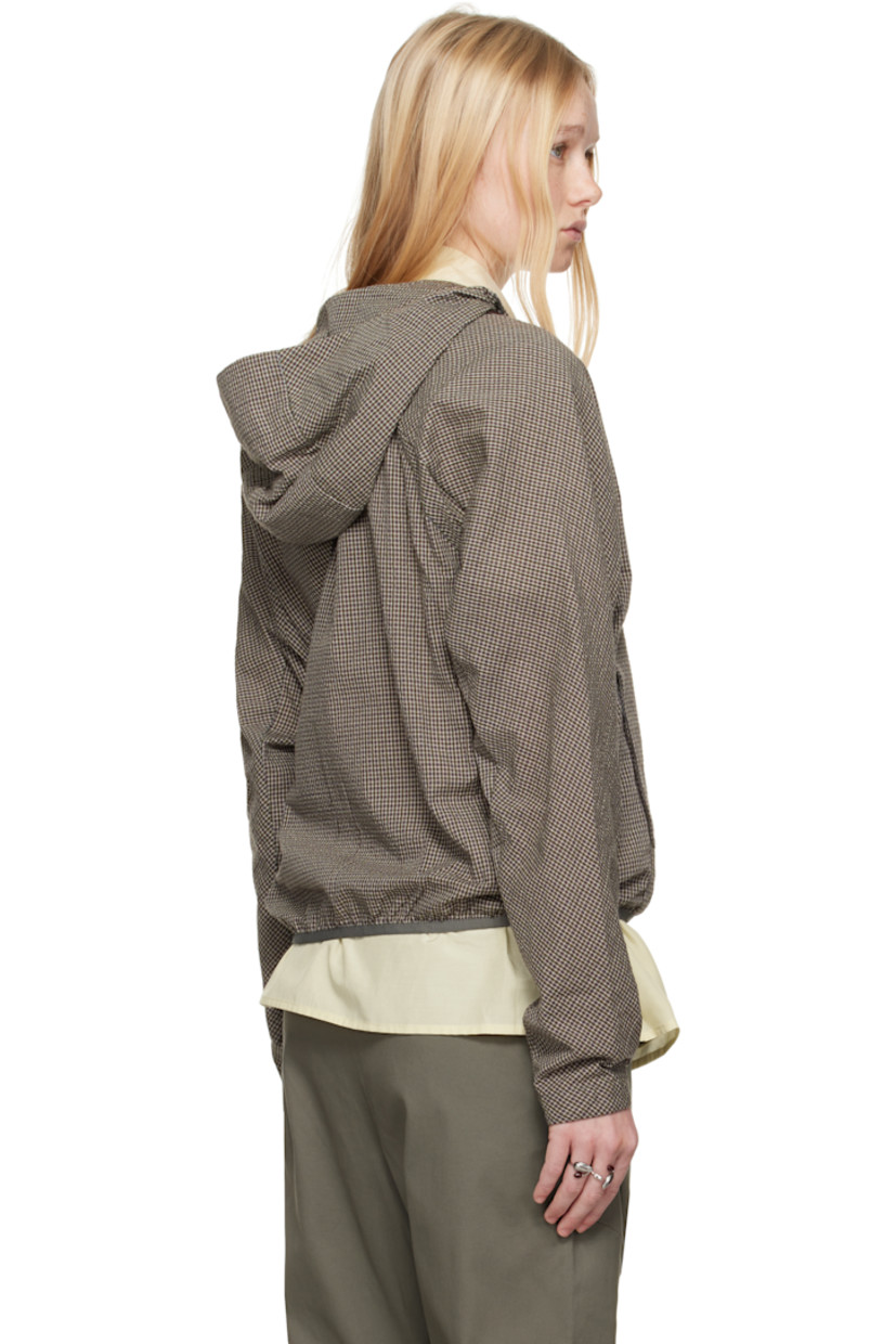 Polyester- and cotton-blend seersucker jacket. Check pattern throughout. 

· Offset zip closure
· Concealed zip pocket at chest
· Zip pockets 
· Elasticized hem and cuffs
· Modified raglan sleeves
· Unlined

Part of the 8.0 collection.  

Supplier color: Brown