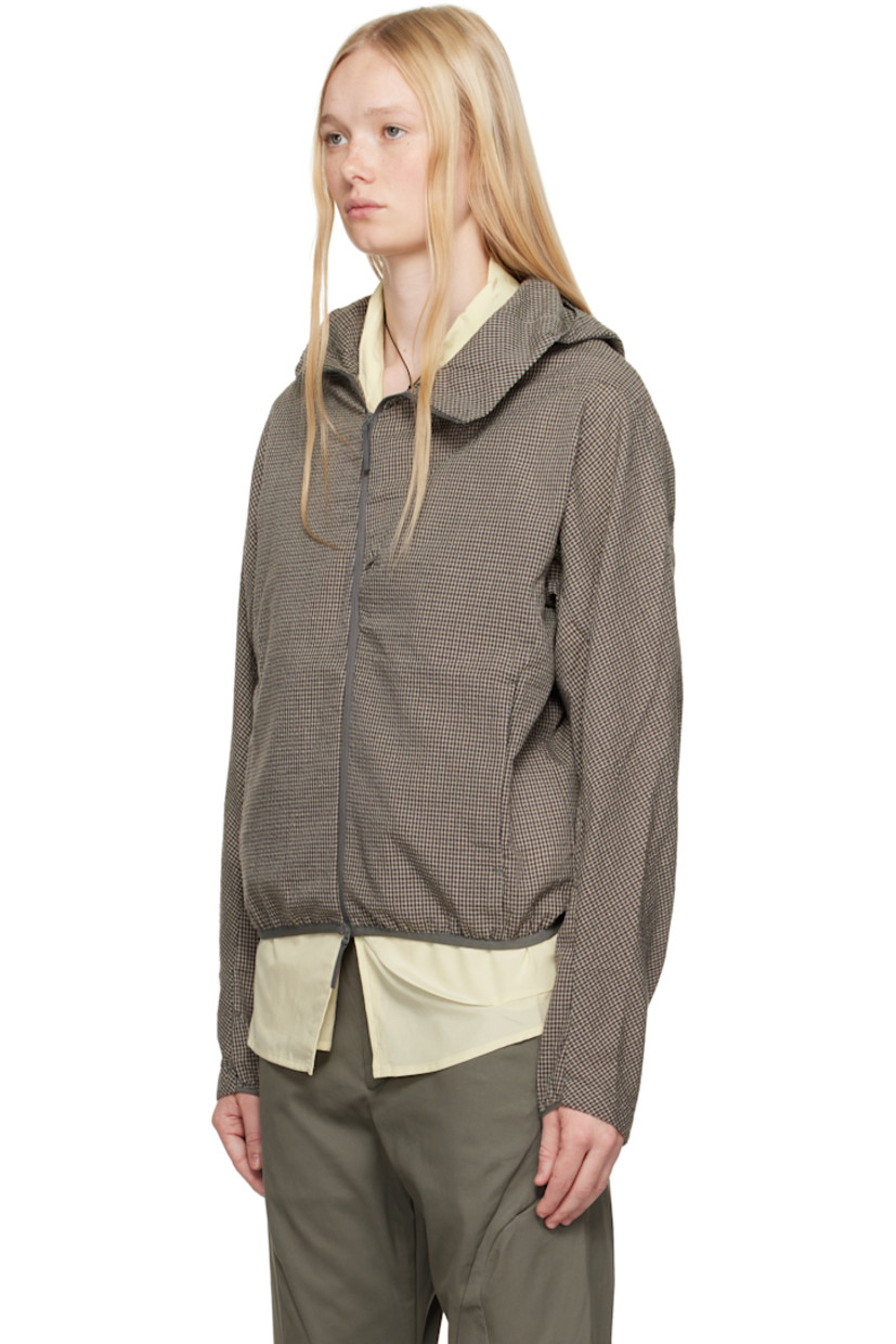 Polyester- and cotton-blend seersucker jacket. Check pattern throughout. 

· Offset zip closure
· Concealed zip pocket at chest
· Zip pockets 
· Elasticized hem and cuffs
· Modified raglan sleeves
· Unlined

Part of the 8.0 collection.  

Supplier color: Brown
