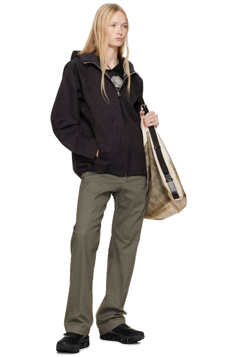 Oversized faux-suede jacket. Water-resistant.

· Offset zip vent at hood 
· Two-way zip closure
· Seam pockets
· Concealed bungee-style drawstring at hem
· Raglan sleeves
· Elasticized cuffs
· Offset two-way zip vent at back hem
· Patch pockets at interior
· Coated jersey lining

Part of the 8.0 collection.  

Supplier color: Black
