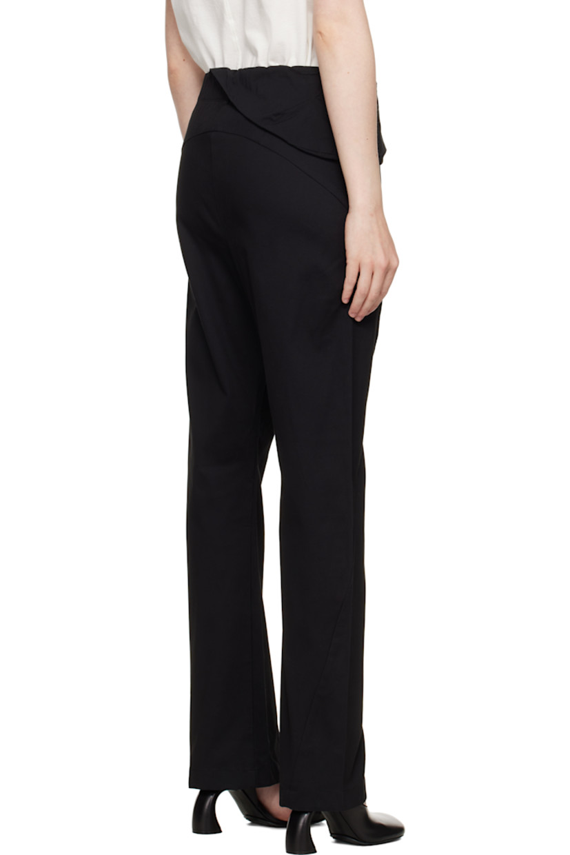 GRANTEX® stretch cotton bedford cord trousers. 

· Slim-fit
· Belt loops at elasticized waistband
· Two-pocket styling
· Zip fly
· Taffeta panel with zip pocket at waist
· Twisted outseams
· Concealed seam pocket at outseam

Part of the 8.0 collection.  

Supplier color: Black