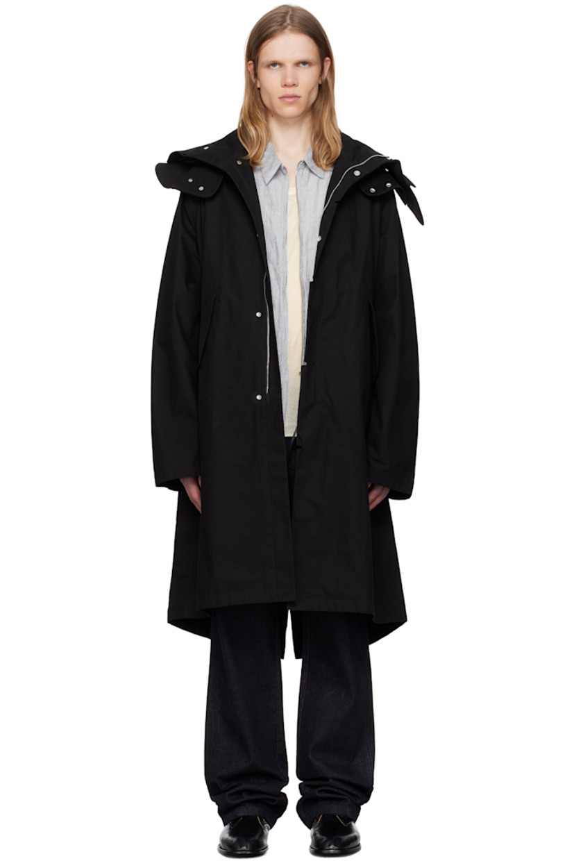 Oversized cotton- and nylon-blend canvas rain coat. Lightweight, windproof, and water-resistant.

· Detachable brimmed hood
· Notches at hood, placket, and cuffs
· Modified spread collar
· Concealed zip closure with press-stud placket
· Flap pockets
· Concealed drawstring at waist
· Tucks at raglan sleeves
· Adjustable press-stud tab at cuffs
· Central vent at back hem
· Unlined

Part of the 8.0 collection.  

Supplier color: Black
