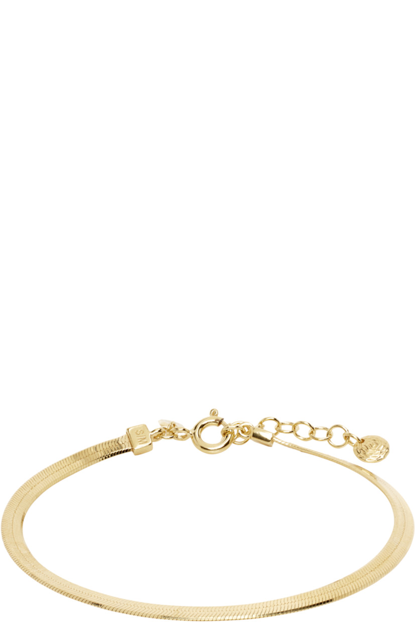 Herringbone chain bracelet in 18k gold-plated recycled sterling silver.

· Charm at adjustable spring-ring fastening
· L7"

Supplier color: Recycled sterling silver/18k gold plated